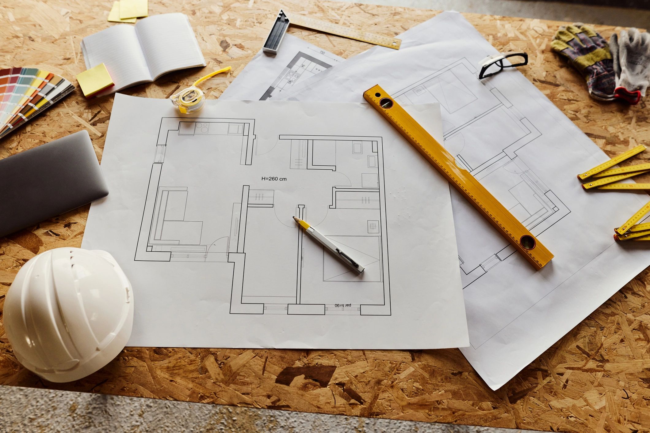 Design sketches and tools on a desk